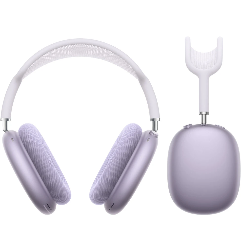 Apple AirPods Max 2 in Purple resting on a wooden desk beside an iPhone 17